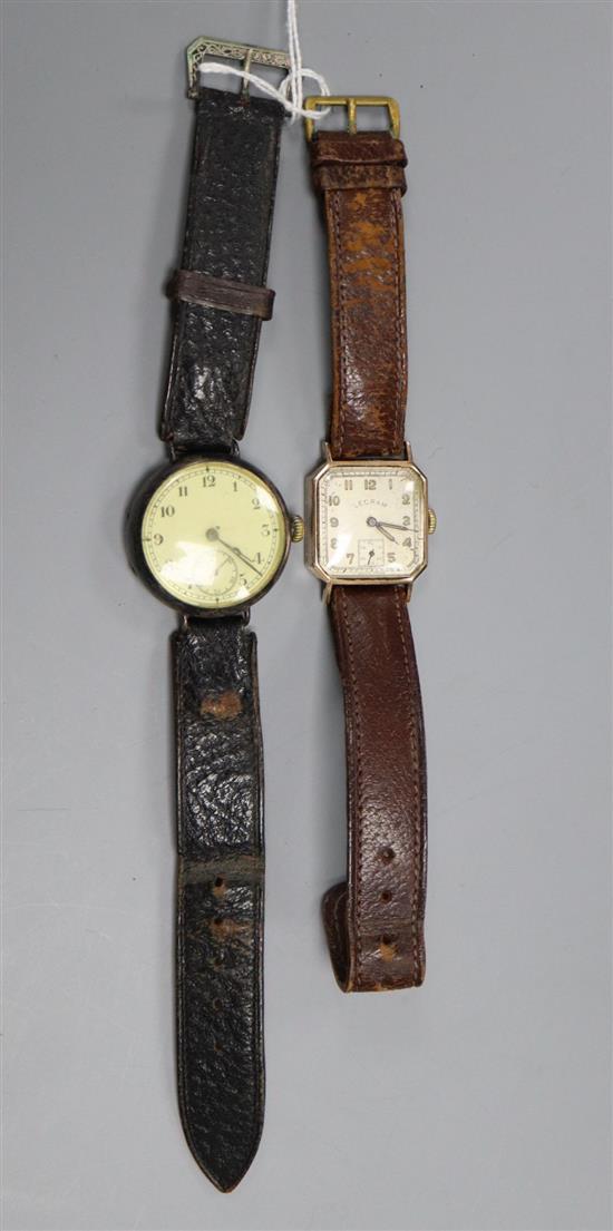 A gentlemans 9ct gold Lecram manual wind wrist watch and a similar early 20th century silver wrist watch.